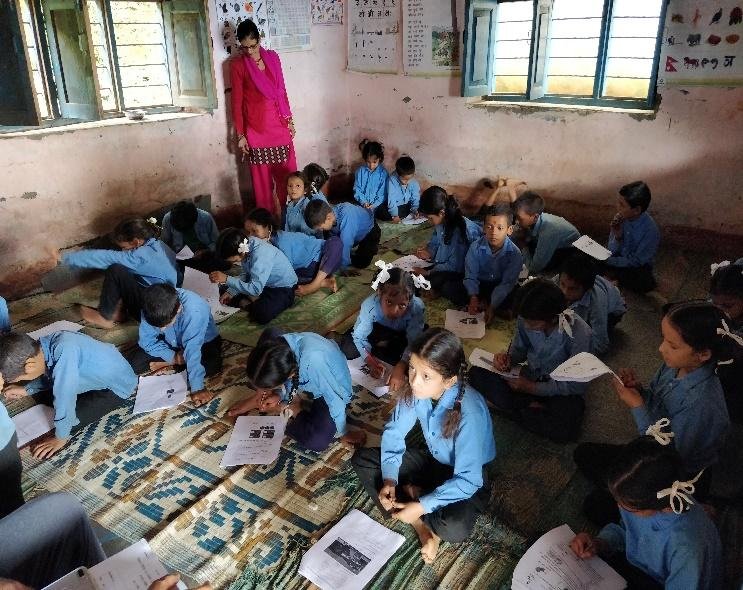 Students taking the midline survey test in Darchula