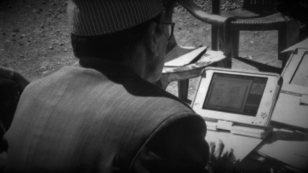 Teacher preparing E-Paath lesson plan Darchula 2019 bw